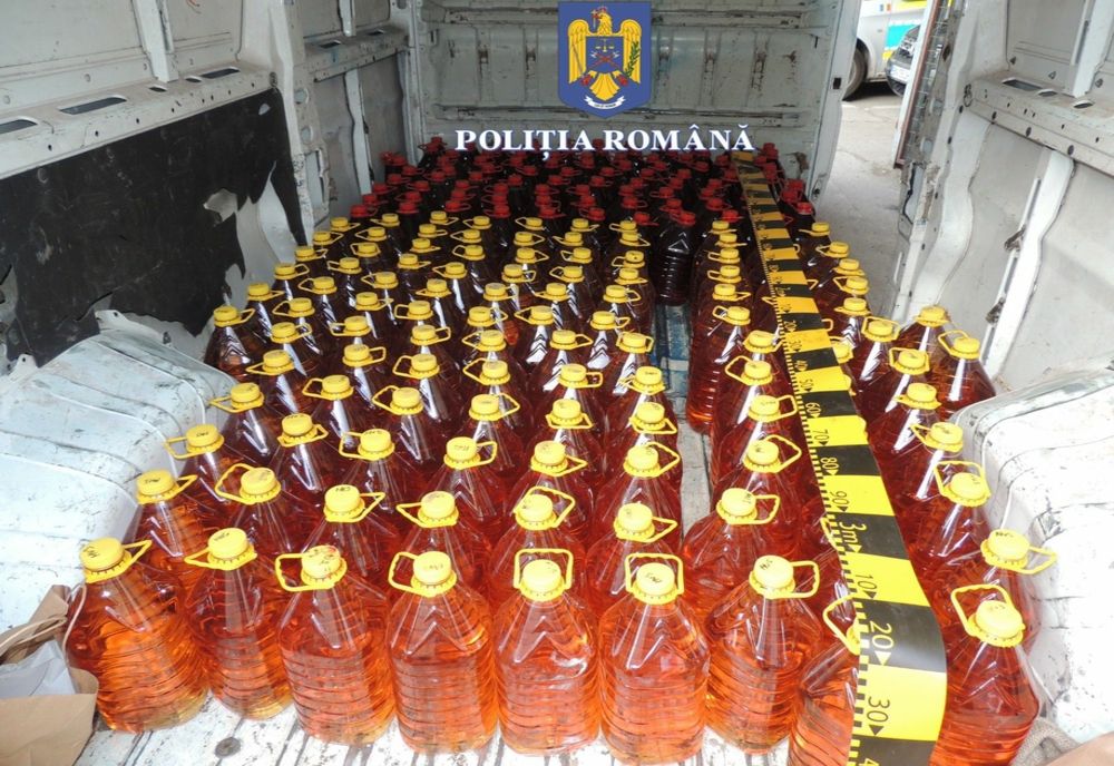 Doi maramureșeni, prinși de polițiștii bistrițeni transportând ilegal peste o mie de litri de alcool 