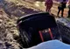 FOTO: Autoturism, înfipt cu botul într-o groapă de pe marginea DN 17C