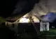 Acoperișul unei case din Mureșenii Bârgăului, afectat de incendiu, din cauza unui coș de fum necurățat